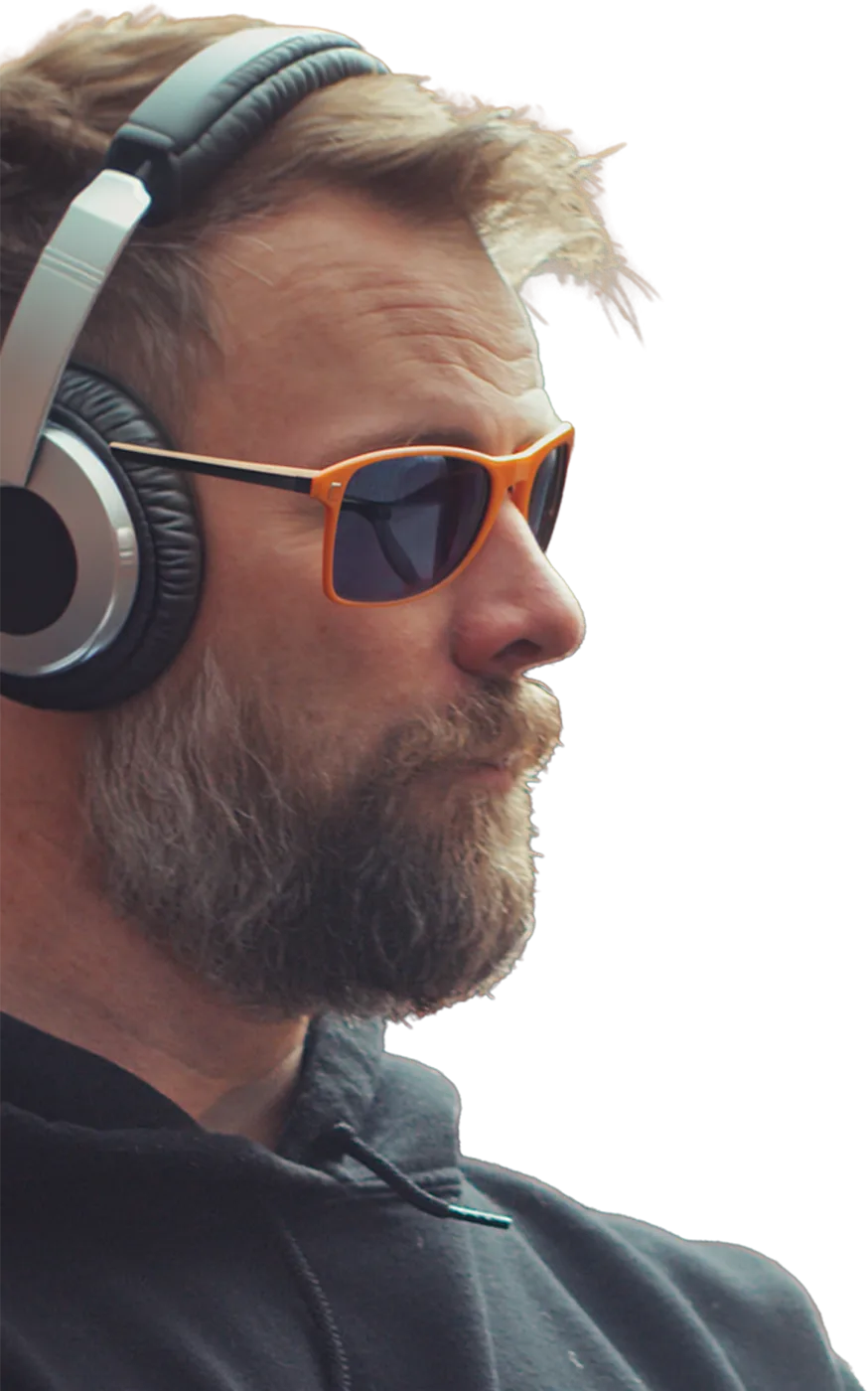 Jon Strand recording a Locke & Ladder video in headphones