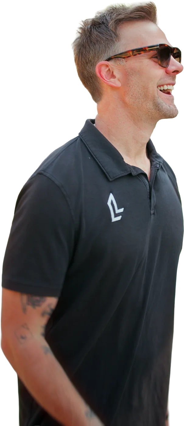 Jon Strand smiling in a Locke & Ladder shirt
