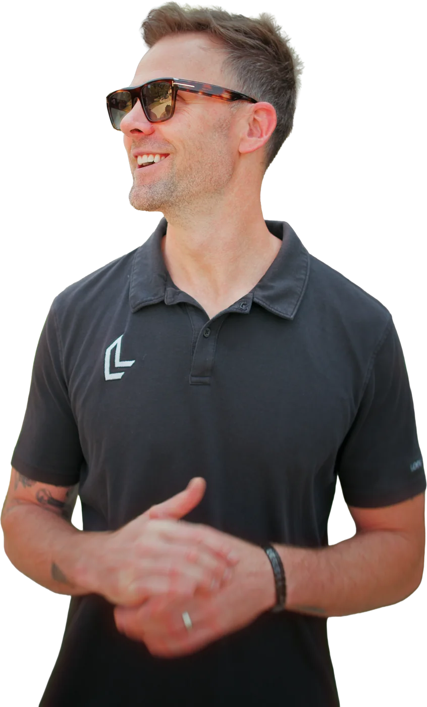 Jon Strand smiling in a Locke & Ladder shirt