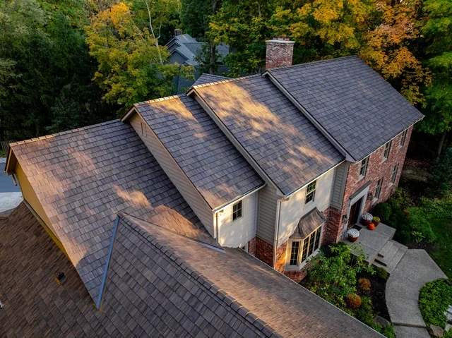 Aerial view of a Brava synthetic cedar roof on a brick home in Carmel, Indiana