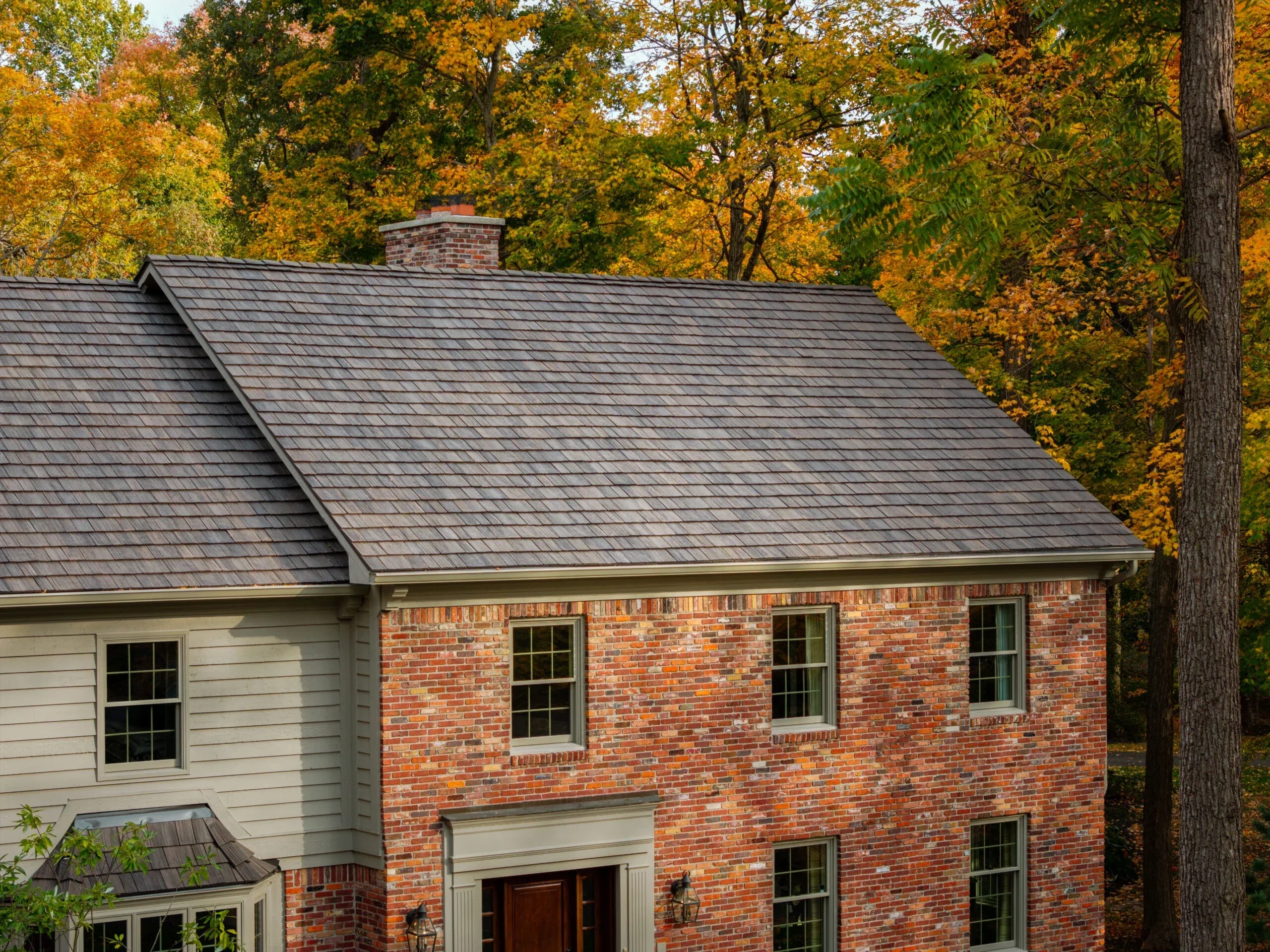 Close roofline view illustrating the staggered, textured appearance associated with cedar shake