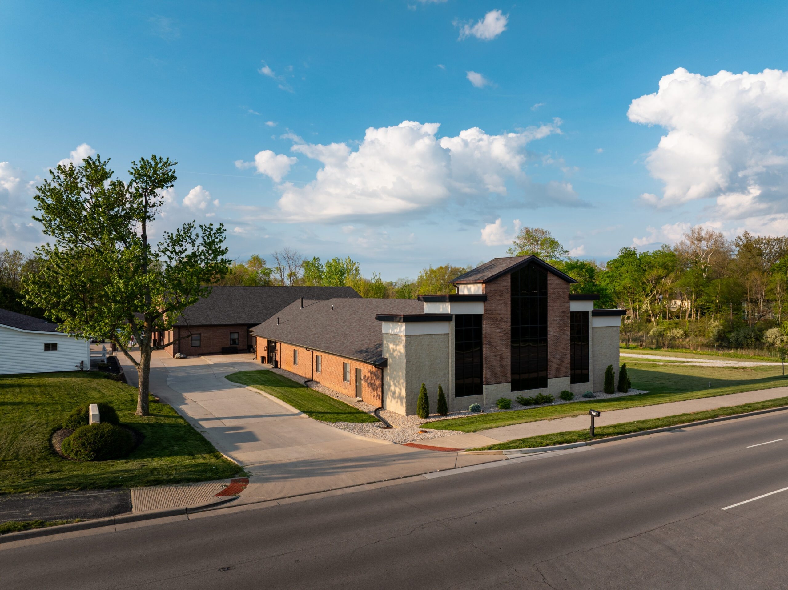 Completed commercial building with roof areas screened behind parapets and architectural walls