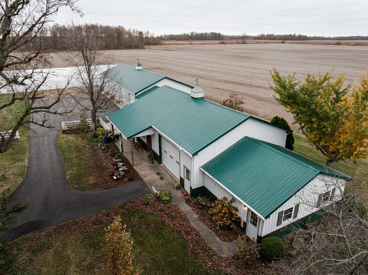 Green standing-seam metal roof on a commercial building in Michigantown, Indiana