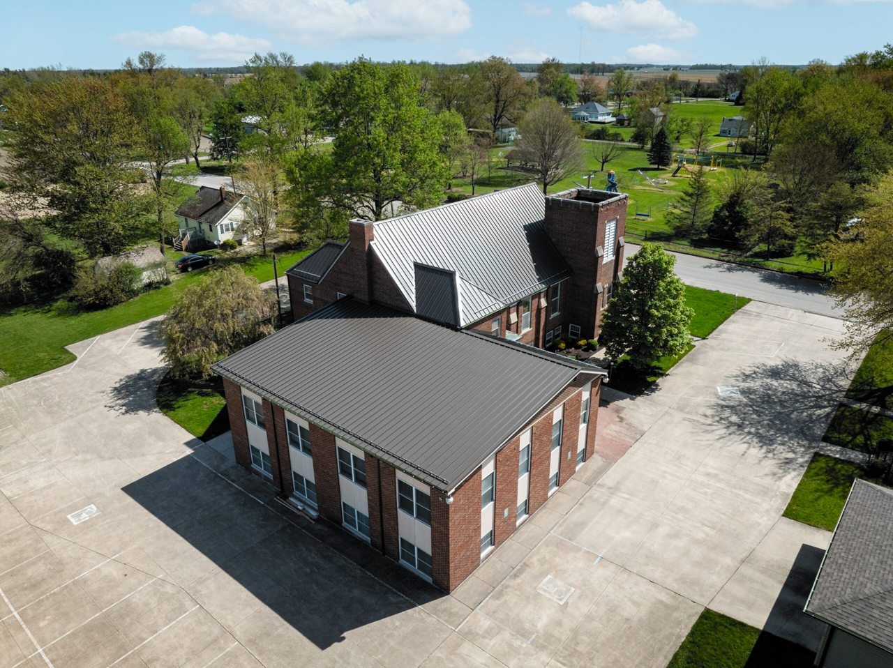 Standing seam metal roofing on a large commercial-style building