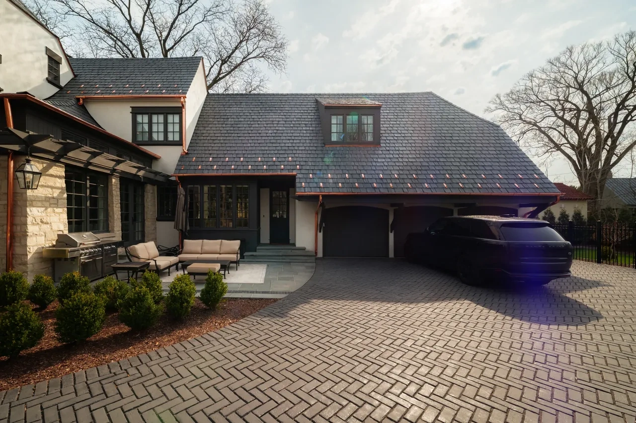 Finished Hinsdale residence with Brava roof viewed from the rear patio