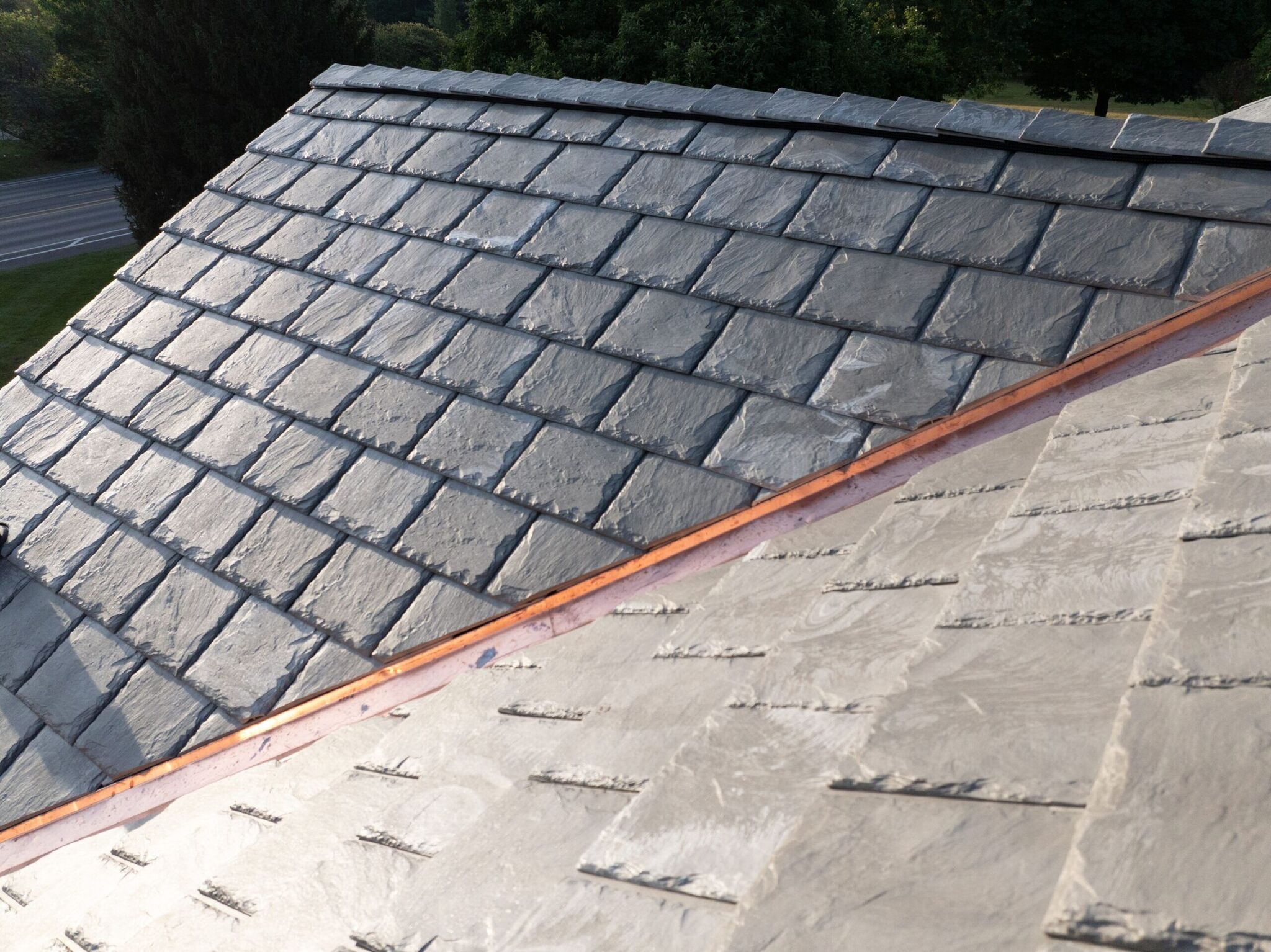 Copper flashing and water-routing detail on a Meridian Hills, Indianapolis roof