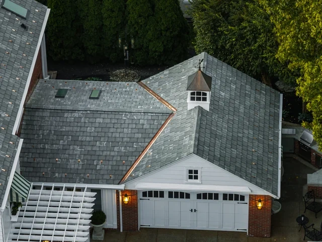 Custom copper bend detail on Brava synthetic slate