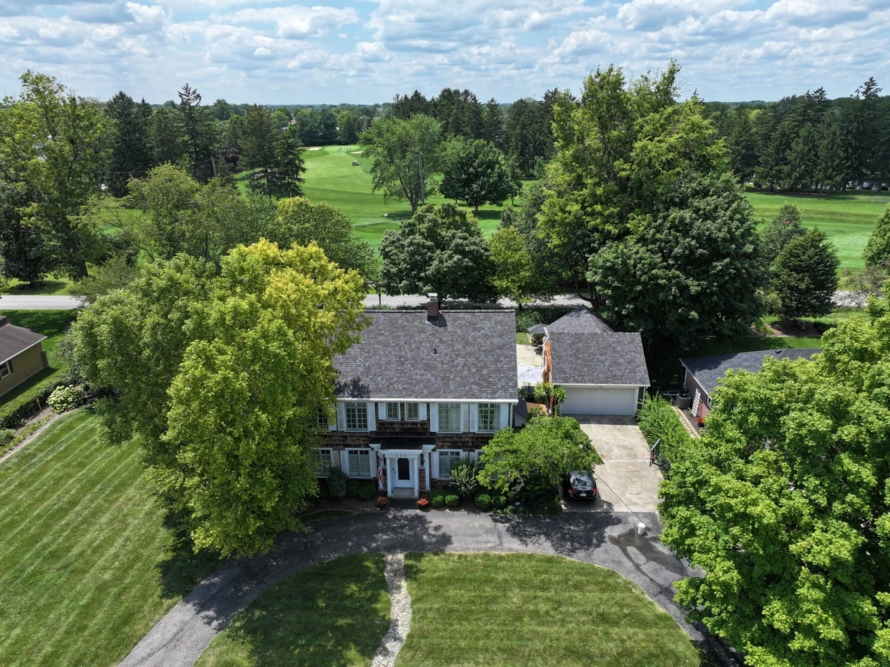 Aerial view of a wooded estate exterior project