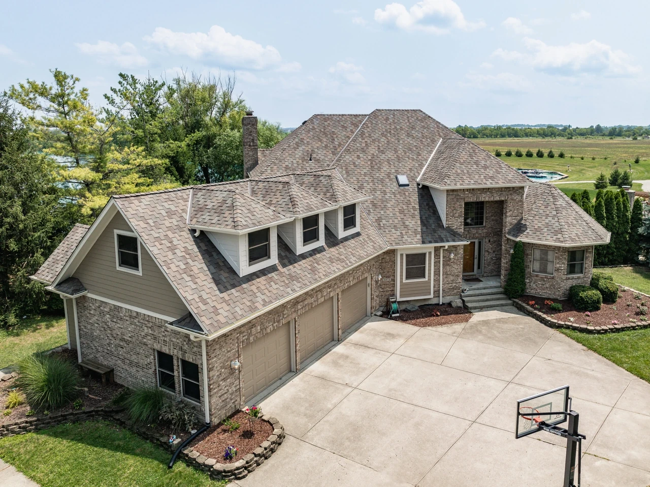 Lakeside stone-and-shingle residence exterior