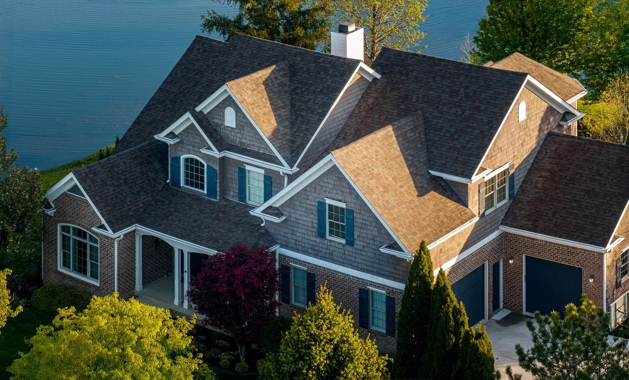 Shingle-style residence exterior, wide view