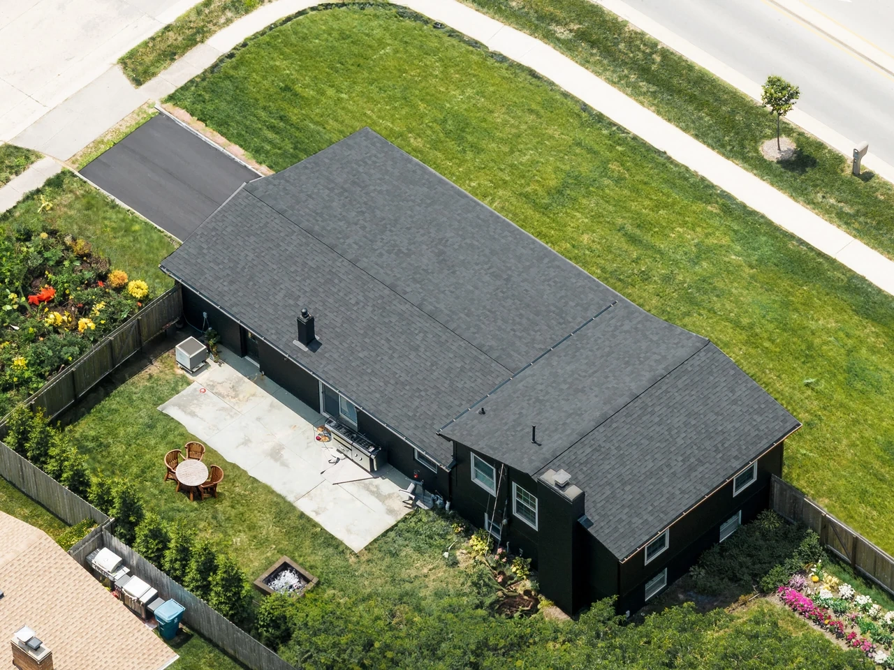 Aerial view of a completed roof replacement in Indianapolis