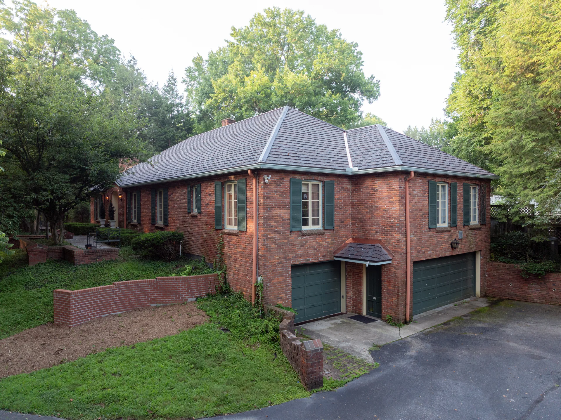 Brick house with a staggered Brava cedar roof in Bloomington, Indiana