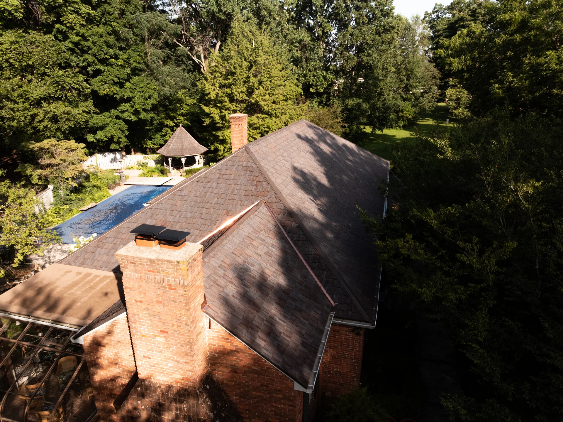 Cedar roof planes and copper valley in Bloomington, Indiana