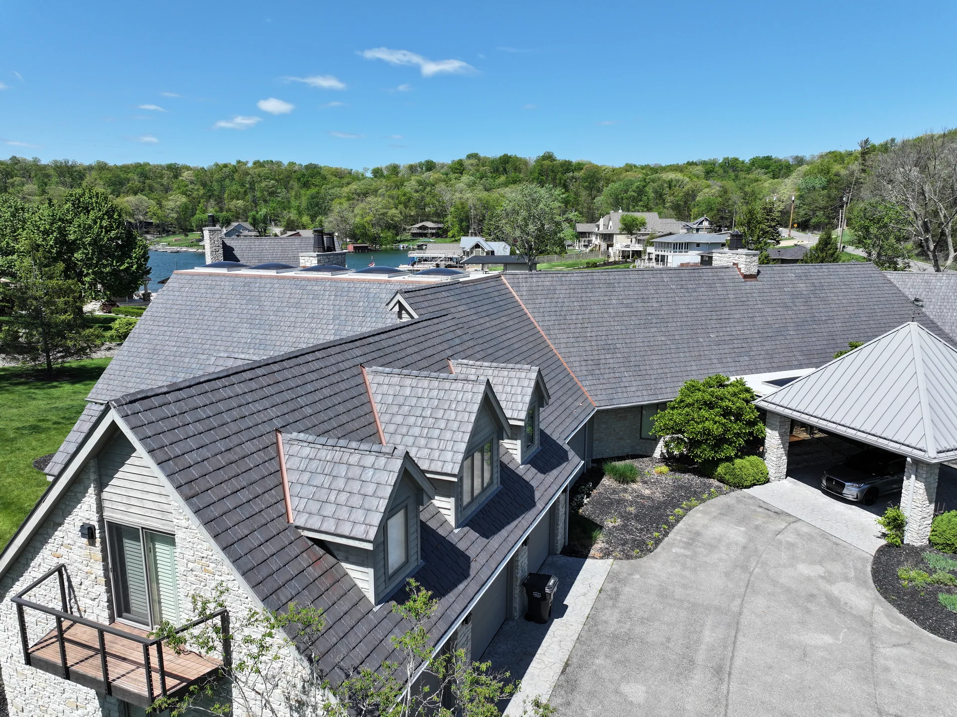 Front gables and dormers with Brava slate roofing in Columbus, Indiana