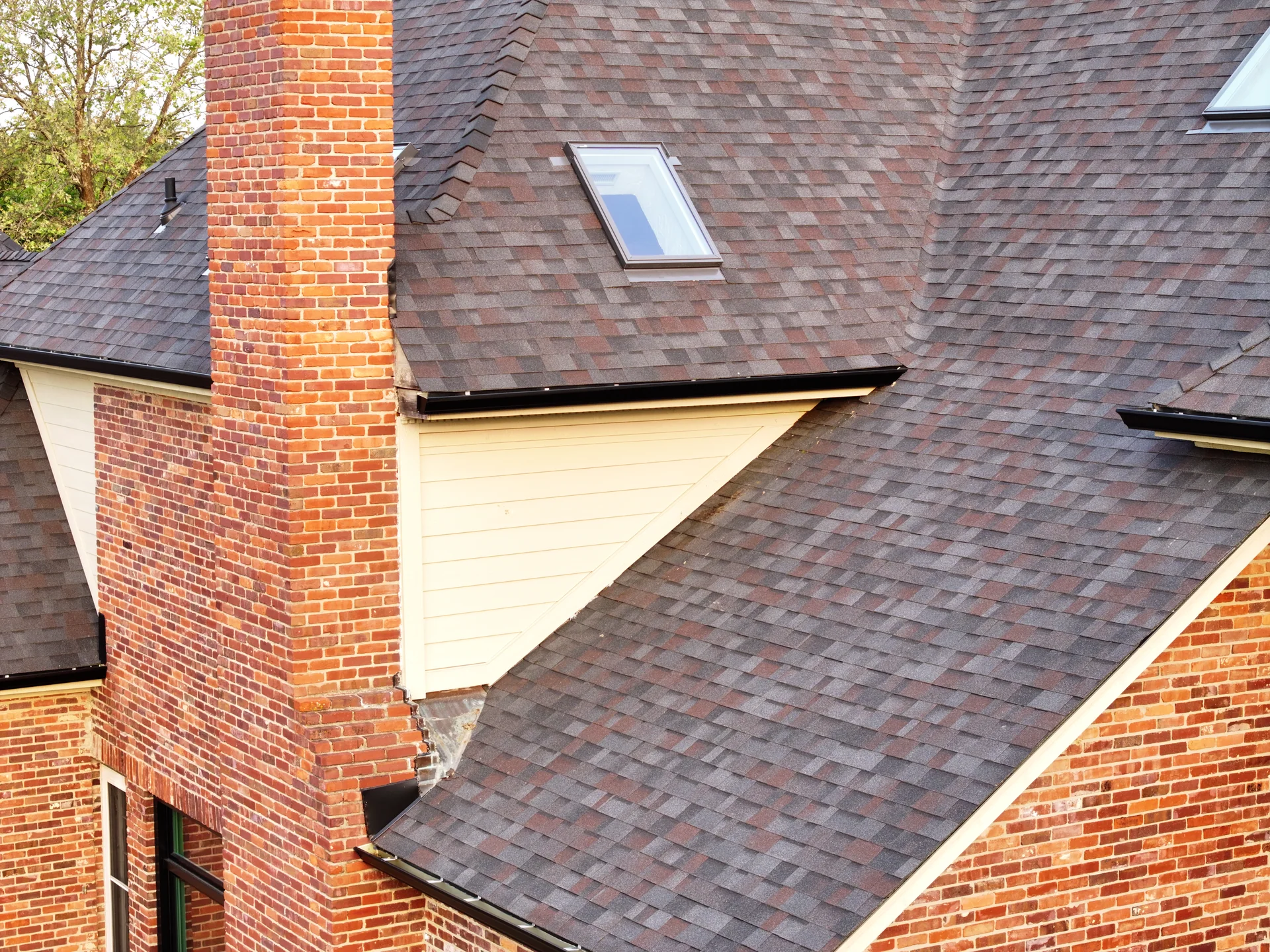 Lap siding below the rear roof and skylight in Carmel, Indiana