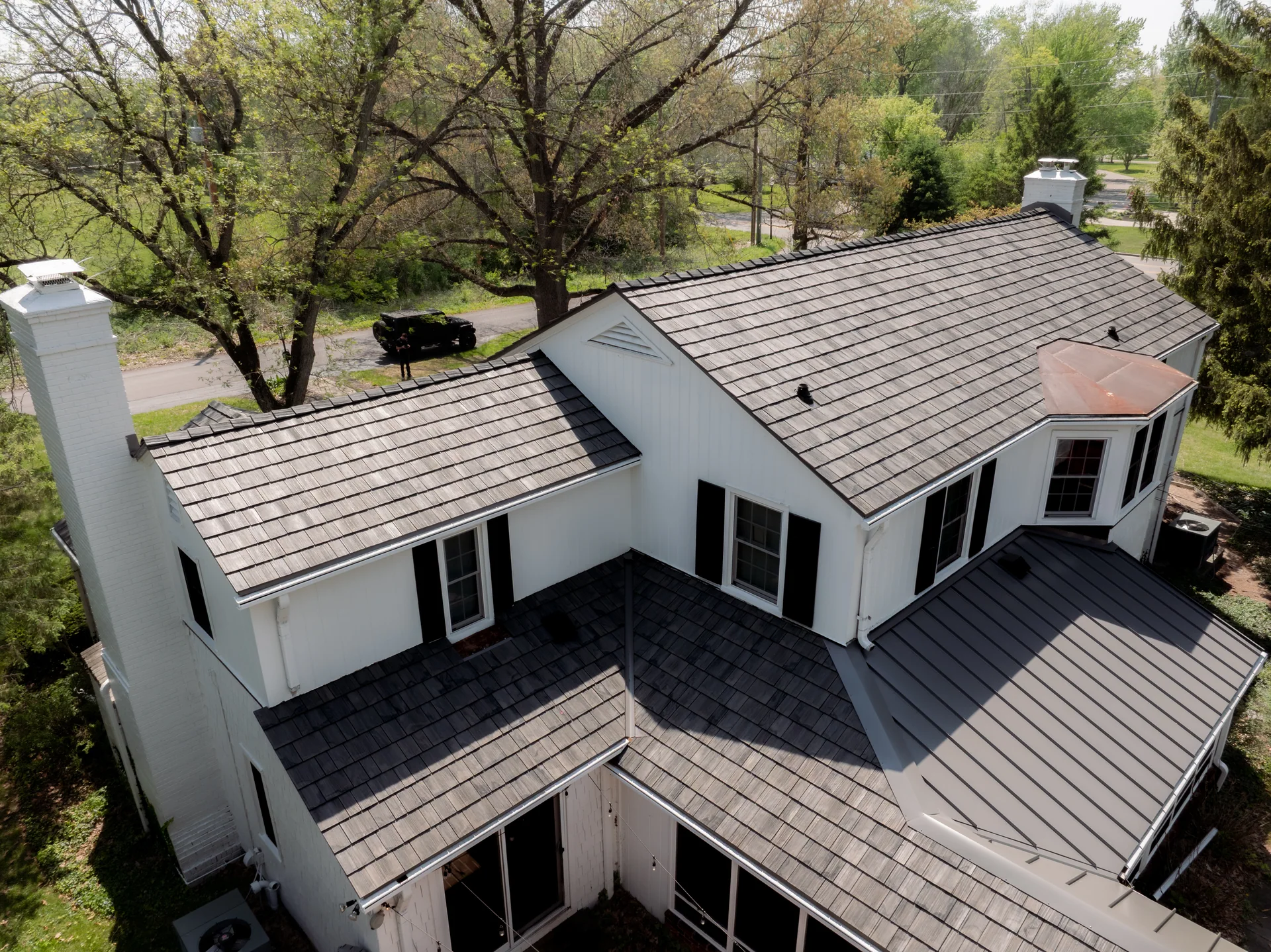 Brava cedar shake beside standing-seam metal roofing in Indianapolis, Indiana