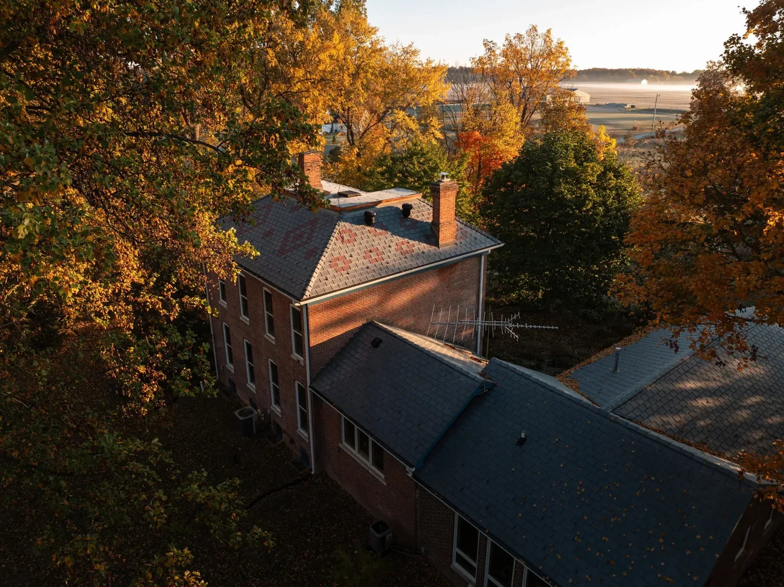 Completed Kirklin roofline with long gutter runs beneath multiple eaves