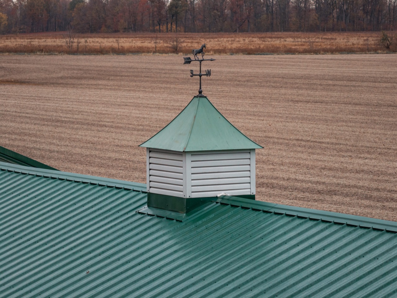 Commercial exposed-fastener metal roofing and gutters project in Michigantown, IN, photo 2 of 8