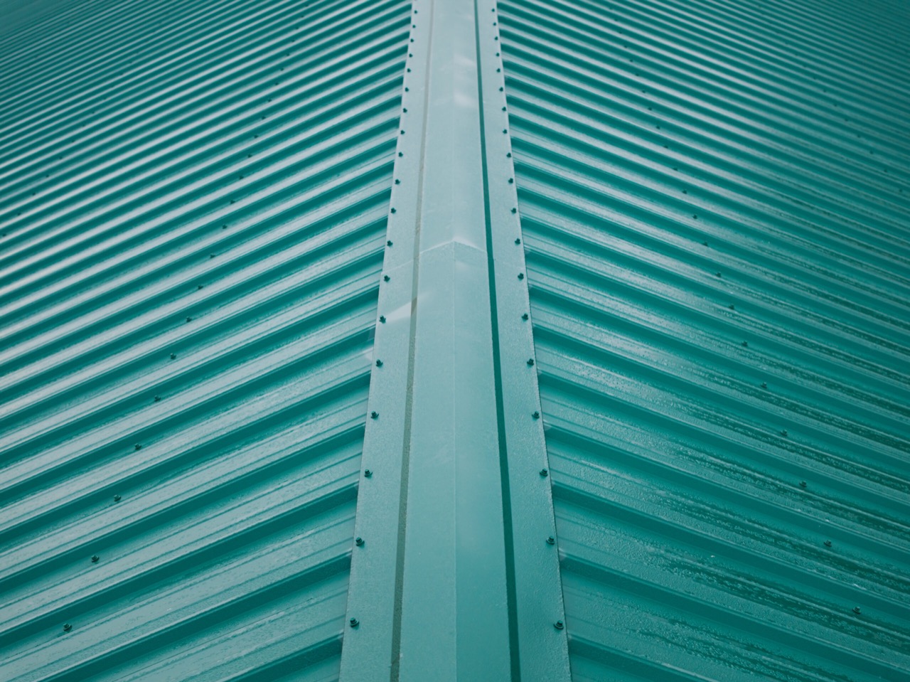 Commercial exposed-fastener metal roofing and gutters project in Michigantown, IN, photo 4 of 8
