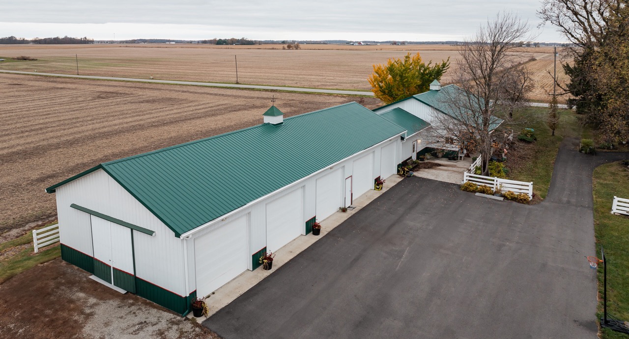 Commercial exposed-fastener metal roofing and gutters project in Michigantown, IN, photo 5 of 8