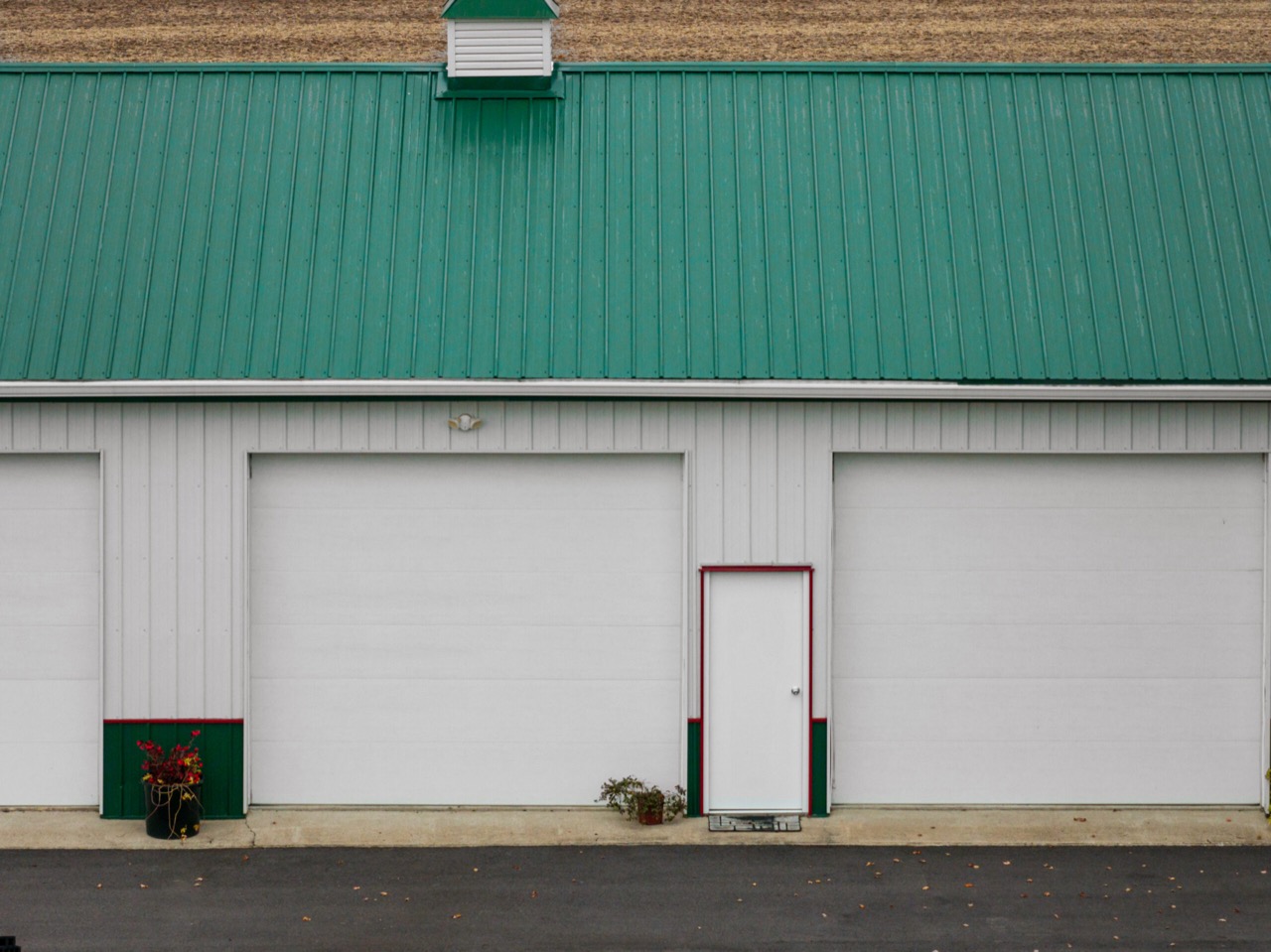 Commercial exposed-fastener metal roofing and gutters project in Michigantown, IN, photo 6 of 8