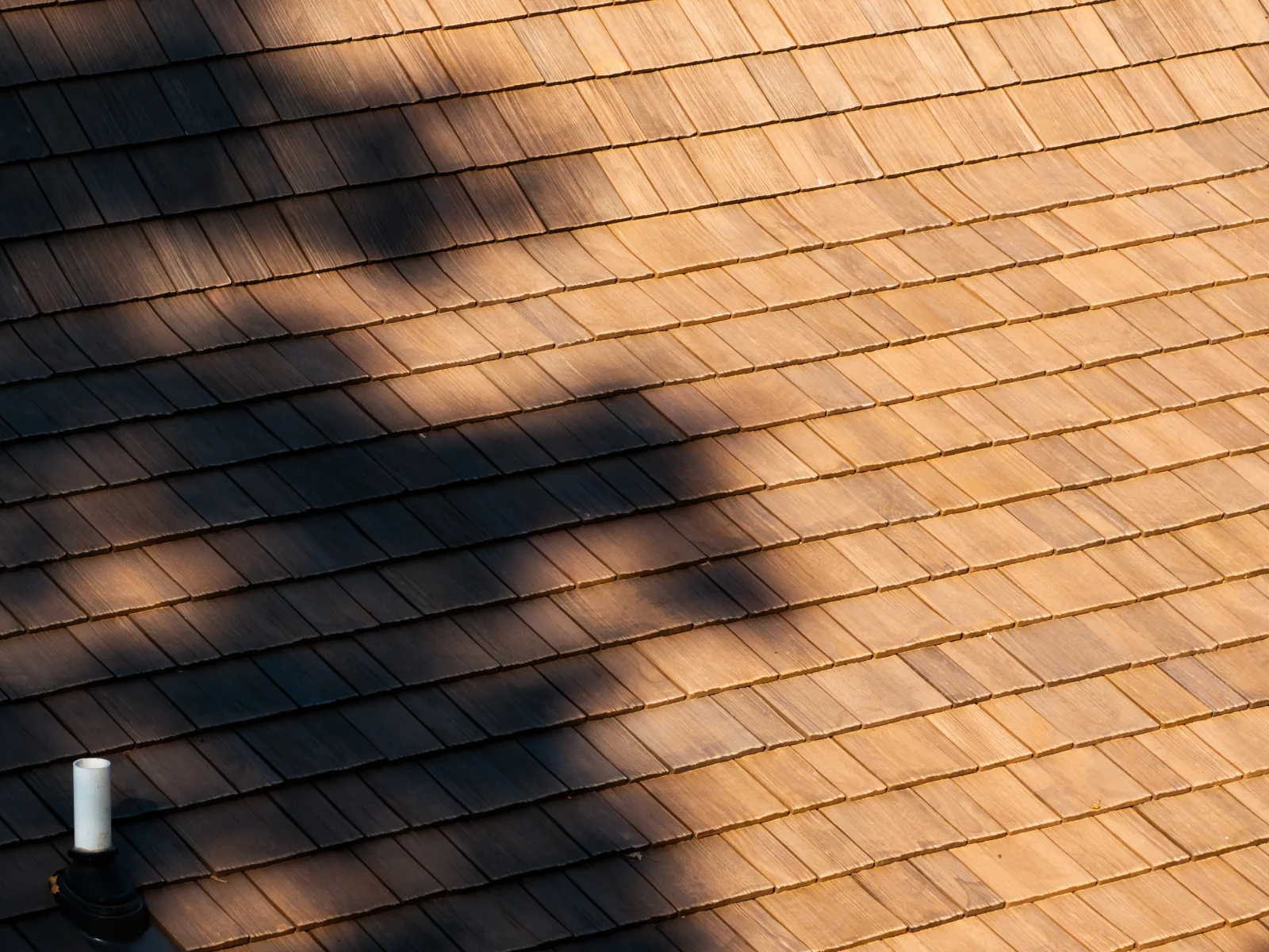 Close view of multi-width Brava composite cedar tiles
