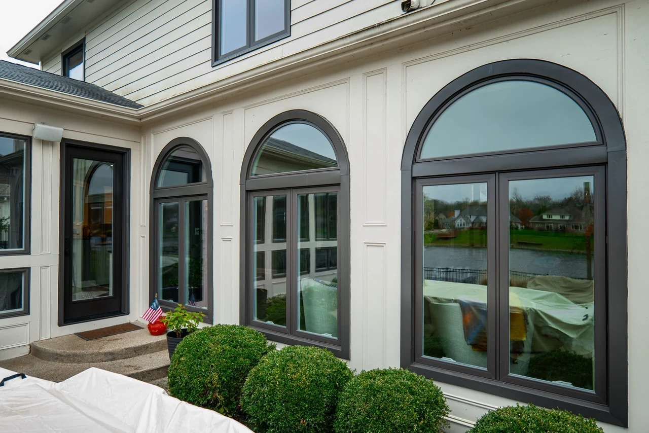 Arched specialty windows and doors on an Indianapolis sunroom