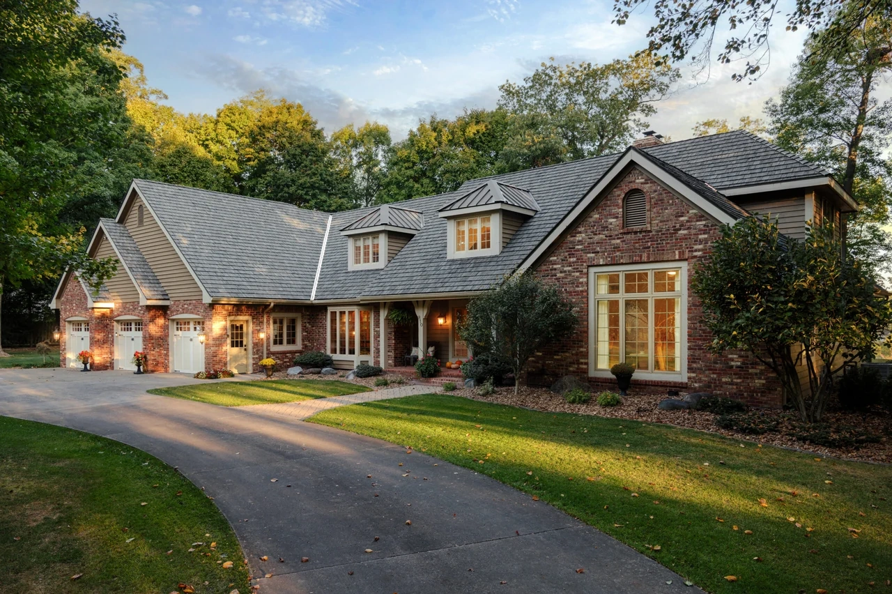 Full exterior renovation on a ranch home at dusk