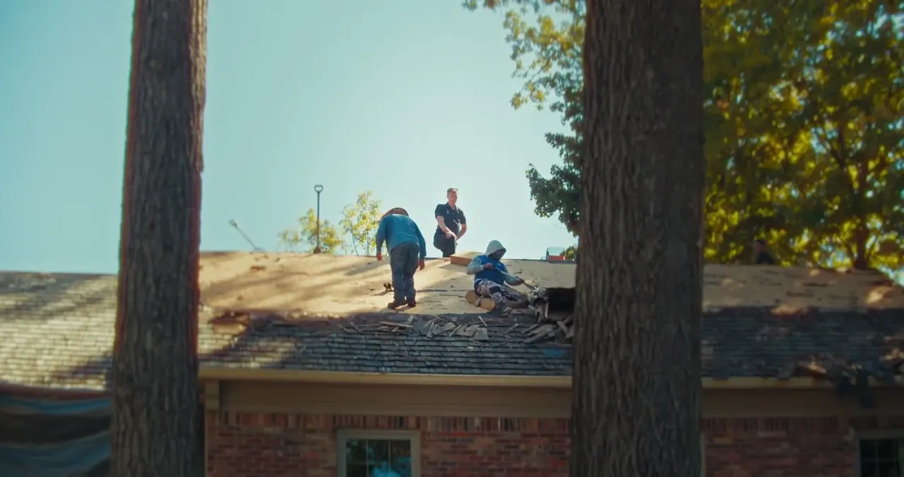 A Locke & Ladder roofing crew on a roof in central Indiana